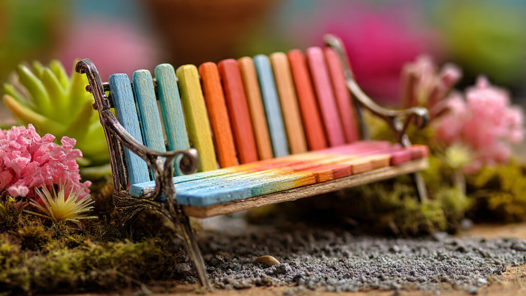 tiny handmade popsicle stick colorful bench placed