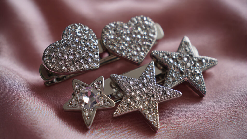 18 Cute Things to Bedazzle for Trendy DIY Crafts and Gifts set of metal hair clips covered with shiny rhinest